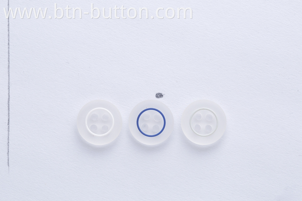 Colored eyelet transparent resin button